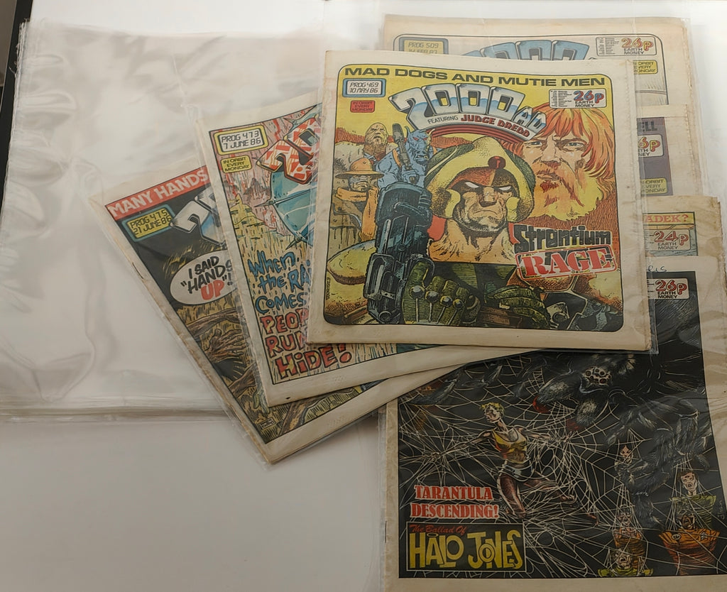 Size F.  Early size 2000AD Backing Boards